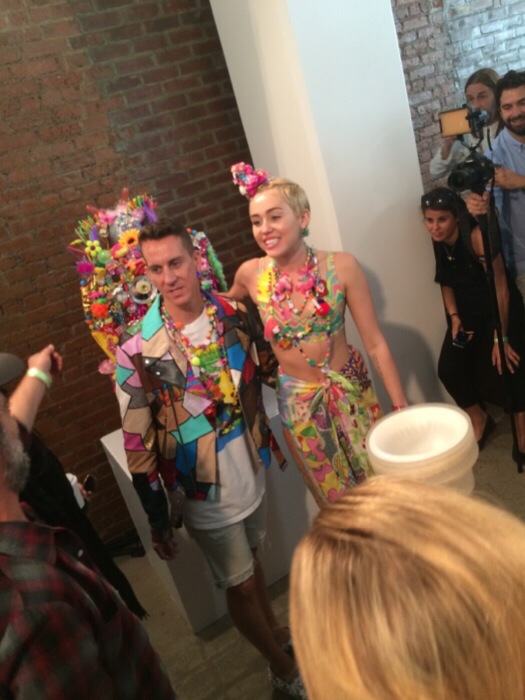 Jeremy Scott and Miley Cyrus backstage at his fashion show