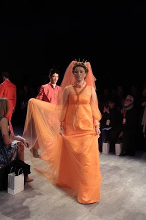 Malan Breton orange gown